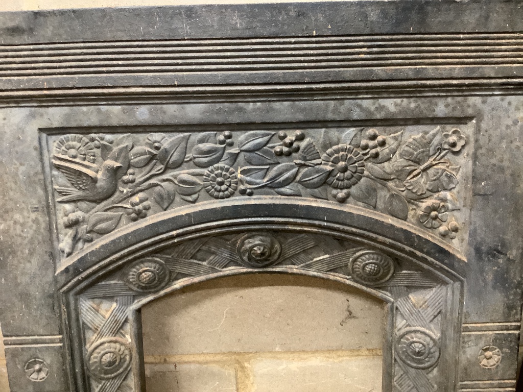 A G Jeykyl Victorian cast iron fireplace surround, length 61cm, height 94cm